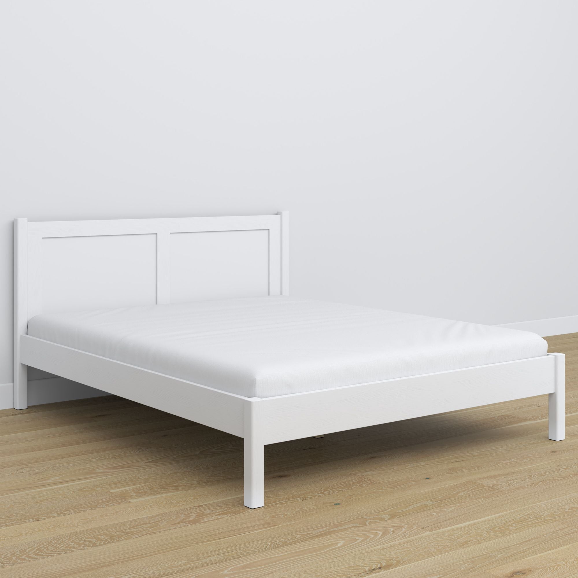 Wooden double bed white – legs and base, close-up of details